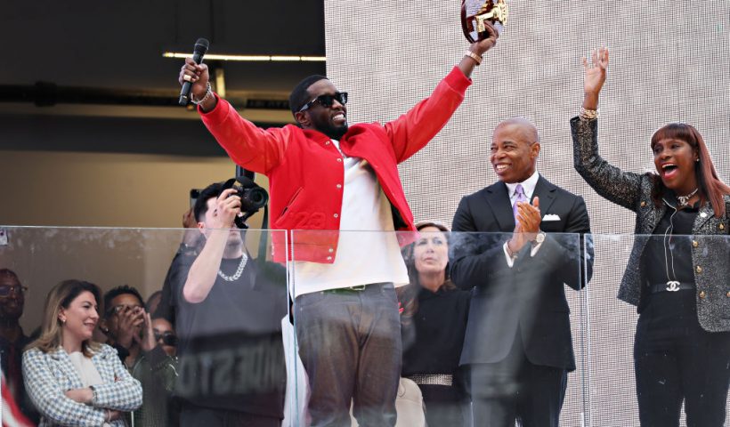 NEW YORK, NEW YORK - SEPTEMBER 15: New York Mayor Eric Adams (R) presents Sean "Diddy" Combs with the keys to the city in Times Square on September 15, 2023 in New York City. (Photo by Cindy Ord/Getty Images)