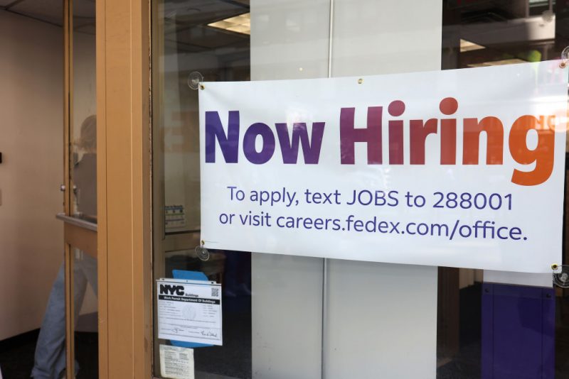 NEW YORK, NEW YORK - JUNE 07: A "Now Hiring" sign is seen at a FedEx location on Broadway on June 07, 2024 in New York City. A jobs report for the month of May released by Labor Department showed that the U.S. added employers added 272,000 nonagricultural jobs and also reported that the unemployment rate rose to 4 percent for the first time in more than two years. (Photo by Michael M. Santiago/Getty Images)