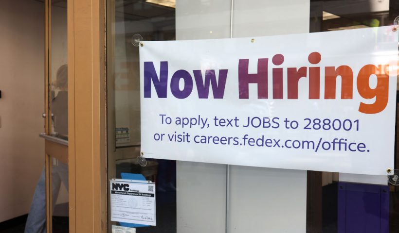 NEW YORK, NEW YORK - JUNE 07: A "Now Hiring" sign is seen at a FedEx location on Broadway on June 07, 2024 in New York City. A jobs report for the month of May released by Labor Department showed that the U.S. added employers added 272,000 nonagricultural jobs and also reported that the unemployment rate rose to 4 percent for the first time in more than two years. (Photo by Michael M. Santiago/Getty Images)