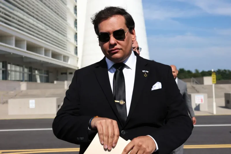 WEST ISLIP, NEW YORK - AUGUST 19: Former U.S. Rep. George Santos prepares to give a statement after a court hearing on August 19, 2024 in West Islip, New York. Santos pleaded guilty to wire fraud and aggravated identity theft weeks before his federal trial was set to begin. His sentencing has been scheduled for February 7, and he faces more than six years in prison under federal sentencing guidelines. Santos owes at least $370,000 in restitution. He was expelled from Congress in 2023, becoming the sixth member in the chamber’s history to be ousted by colleagues. (Photo by Michael M. Santiago/Getty Images)