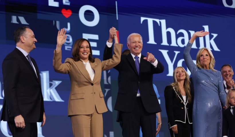 CHICAGO, ILLINOIS - AUGUST 19: (L-R) Second Gentleman Doug Emhoff, Democratic presidential candidate, U.S. Vice President Kamala Harris, U.S. President Joe Biden and First Lady Jill Biden appear onstage during the first day of the Democratic National Convention at the United Center on August 19, 2024 in Chicago, Illinois. Delegates, politicians, and Democratic party supporters are in Chicago for the convention, concluding with current Vice President Kamala Harris accepting her party's presidential nomination. The DNC takes place from August 19-22. (Photo by Justin Sullivan/Getty Images)
