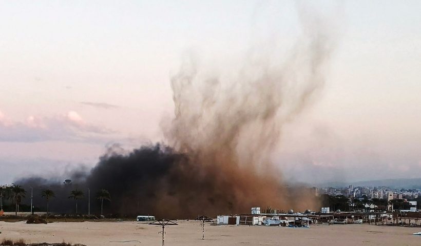 Smoke rises from the site of an Israeli airstrike the sea front in the southern Lebanese city of Tyre on October 31, 2024, amid the ongoing war between Israel and Hezbollah. (Photo by KAWNAT HAJU / AFP) (Photo by KAWNAT HAJU/AFP via Getty Images)