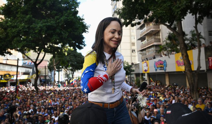 Venezuelan opposition leader Maria Corina Machado gestures as she gives a speech during a protest called by the opposition on the eve of the presidential inauguration, in Caracas on January 9, 2025. Venezuela is on tenterhooks facing demonstrations called by both the opposition and government supporters. Machado emerged from hiding to lead protests in Caracas against the swearing-in of Nicolas Maduro for a highly controversial third term as president. (Photo by Federico PARRA / AFP) (Photo by FEDERICO PARRA/AFP via Getty Images)