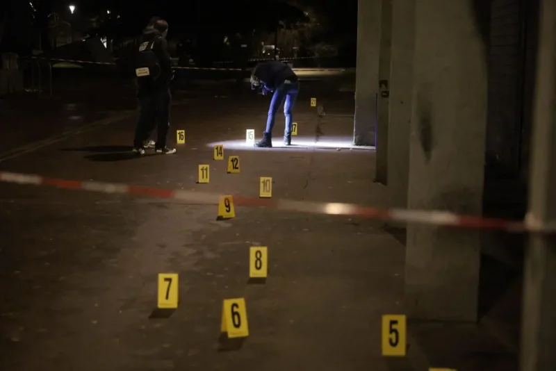 Police investigators work near the scene of an explosion at a bar where a grenade was thrown, in Grenoble, on February 12, 2025. At least nine people were injured, one seriously, after an explosion, possibly of criminal origin, in a bar in Grenoble on February 12, 2025. The explosion took place shortly after 8pm emergency services told AFP. A source close to the case mentioned a possible malicious act that could be due to a grenade. (Photo by Maxime GRUSS / AFP) (Photo by MAXIME GRUSS/AFP via Getty Images)