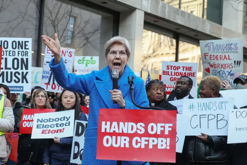 WASHINGTON, DC - FEBRUARY 10: U.S. Sen. Elizabeth Warren (D-MA) speaks as Congressional Democrats and CFPB workers hold a rally to protest the closing of the Consumer Financial Protection Bureau (CFPB) and the work-from-home order issued by CFPB Director Russell Vought outside its headquarters on February 10, 2025 in Washington, DC. (Photo by Jemal Countess/Getty Images for MoveOn)