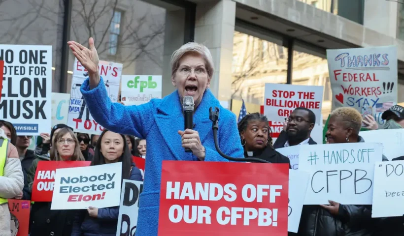 WASHINGTON, DC - FEBRUARY 10: U.S. Sen. Elizabeth Warren (D-MA) speaks as Congressional Democrats and CFPB workers hold a rally to protest the closing of the Consumer Financial Protection Bureau (CFPB) and the work-from-home order issued by CFPB Director Russell Vought outside its headquarters on February 10, 2025 in Washington, DC. (Photo by Jemal Countess/Getty Images for MoveOn)
