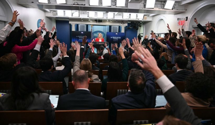 TOPSHOT - White House Press Secretary Karoline Leavitt (C) takes questions during the daily briefing in the Brady Briefing Room of the White House in Washington, DC, on February 25, 2025. (Photo by Jim WATSON / AFP) (Photo by JIM WATSON/AFP via Getty Images)