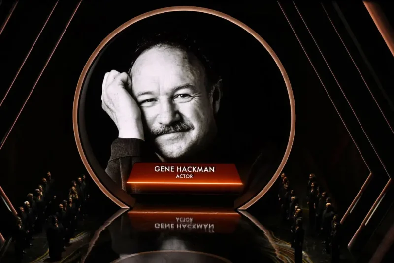 An image of late US actor Gene Hackman is seen on a screen during an 'in memoriam' segment at the 97th Annual Academy Awards at the Dolby Theatre in Hollywood, California on March 2, 2025. (Photo by Patrick T. Fallon / AFP) (Photo by PATRICK T. FALLON/AFP via Getty Images)