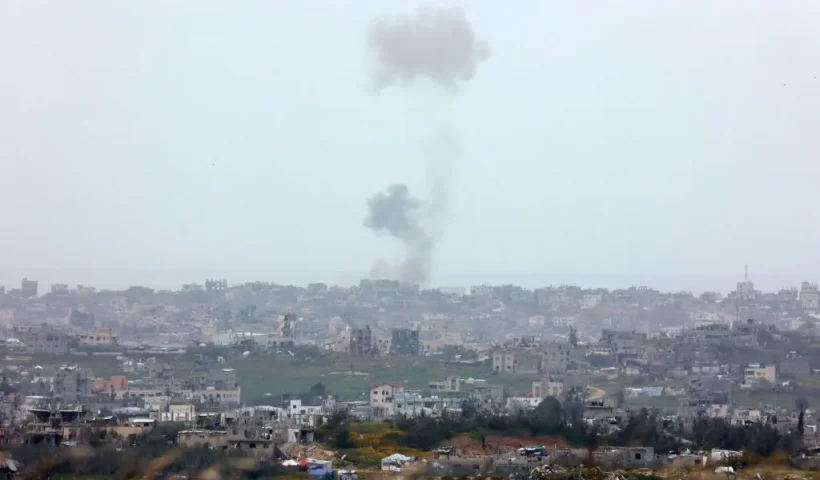 This picture taken from Israel's southern border with the northern Gaza Strip, shows smoke rising in the Palestinian territory during an Israeli strike on March 20, 2025. Israel bombarded Gaza and pressed its ground operations on March 20, after issuing what it called a "last warning" for Palestinians to return hostages and remove Hamas from power. (Photo by GIL COHEN-MAGEN / AFP) (Photo by GIL COHEN-MAGEN/AFP via Getty Images)