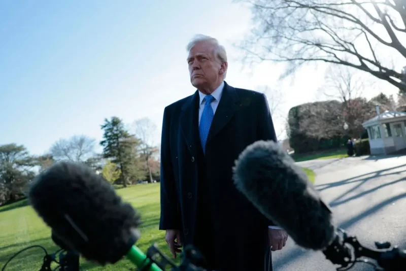 WASHINGTON, DC - MARCH 21: U.S. President Donald Trump speaks to reporters before boarding Marine One at the White House on March 21, 2025 in Washington, DC. Trump is traveling to Bedminster, New Jersey and is expected to attend the 2025 NCAA Division I Men’s Wrestling Championship in Philadelphia tomorrow. (Photo by Anna Moneymaker/Getty Images)