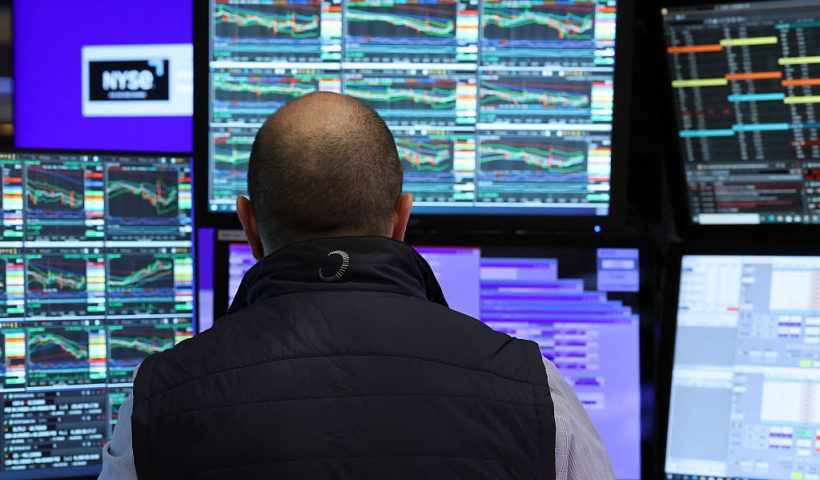 Traders work on the floor of the New York Stock Exchange (NYSE) at the opening bell on April 9, 2025, in New York City. Wall Street stocks were mixed in early trading Wednesday as markets digested the latest tariff hike by the United States and retaliatory moves by China and the European Union. (Photo by TIMOTHY A. CLARY / AFP) (Photo by TIMOTHY A. CLARY/AFP via Getty Images)