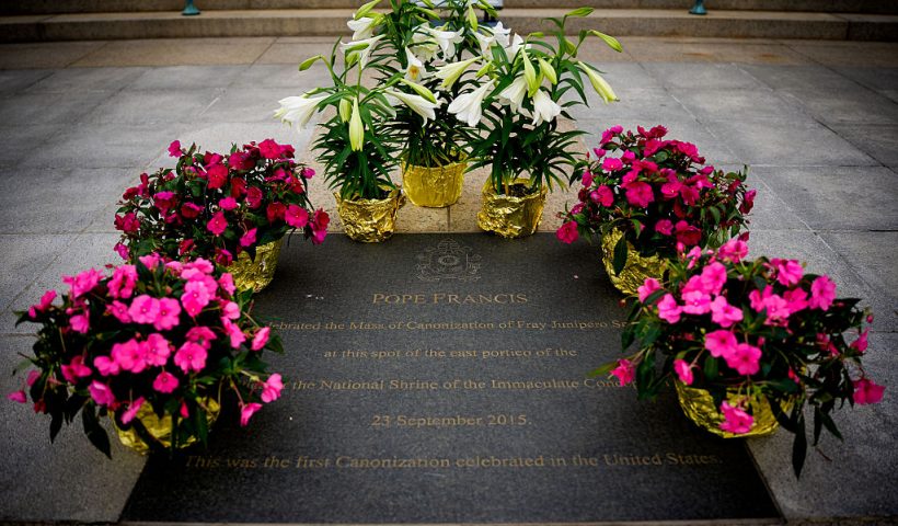 WASHINGTON, DC - APRIL 21: Flowers are placed around a plaque commemorating a 2015 visit from Pope Francis at the Basilica of the National Shrine of the Immaculate Conception in the wake of the the death of Pope Francis on April 21, 2025 in Washington, DC. The Vatican announced that Pope Francis, 88, died on Monday at 07:35 local time and "the Bishop of Rome, Francis, returned to the home of the Father". His death comes after he appeared in St Peter's Square on Easter Sunday, greeting thousands of worshippers. (Photo by Andrew Harnik/Getty Images)