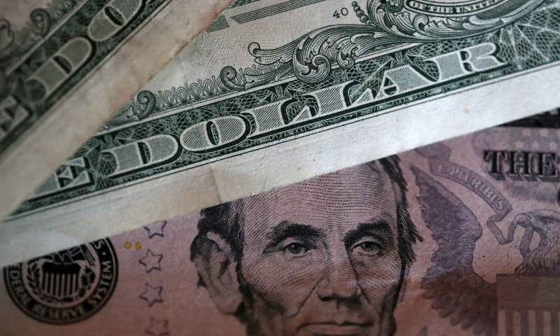 SAN ANSELMO, CA - AUGUST 29: In this Photo Illustration, One and five dollar bills are displayed on August 29, 2017 in San Anselmo, California. (Photo Illustration by Justin Sullivan/Getty Images)