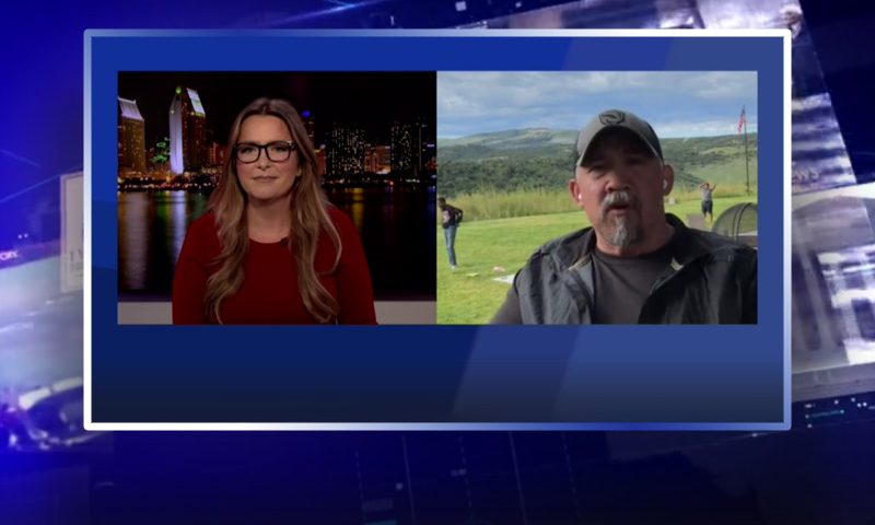Video still from Will Spencer's interview with The Real Story on One America News Network