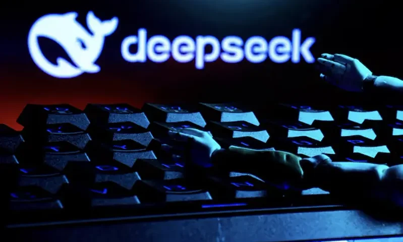 The deepSeek logo, a keyboard, and robot hands are seen in this illustration taken January 27, 2025. REUTERS/Dado Ruvic/Illustration/File Photo/File Photo