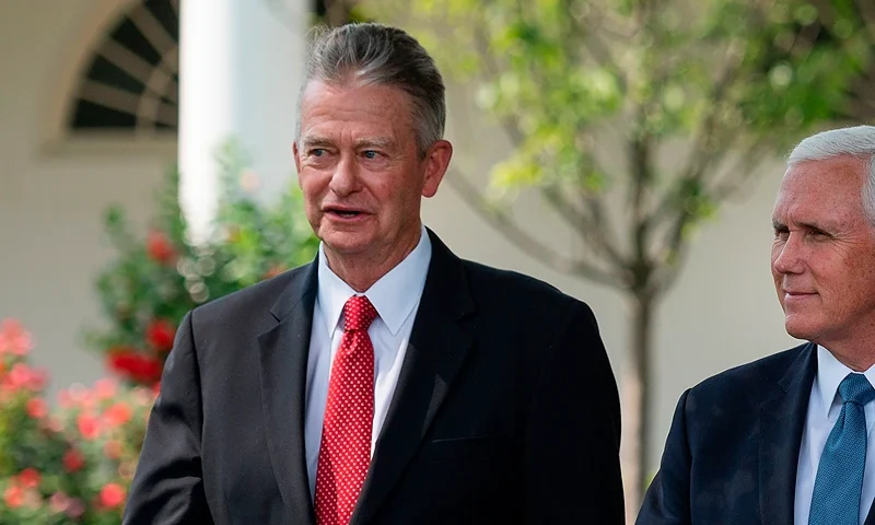 Mike Pence(C) walks with Idaho Governor Brad Little (L) and Alaska Governor Mike Dunleavy (R) at the White House in Washington, DC, on July 16, 2020, as US President Donald Trump delivers remarks on Rolling Back Regulations to Help All Americans on the South Lawn at the White House in Washington,DC. (Photo by JIM WATSON/AFP via Getty Images)