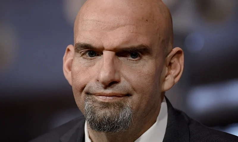 US Democratic Senator from Pennsylvania John Fetterman is ceremonially sworn in by Vice President Kamala Harris for the 118th Congress in the Old Senate Chamber at the US Capitol in Washington, DC, January 3, 2023. (Photo by OLIVIER DOULIERY/AFP via Getty Images)