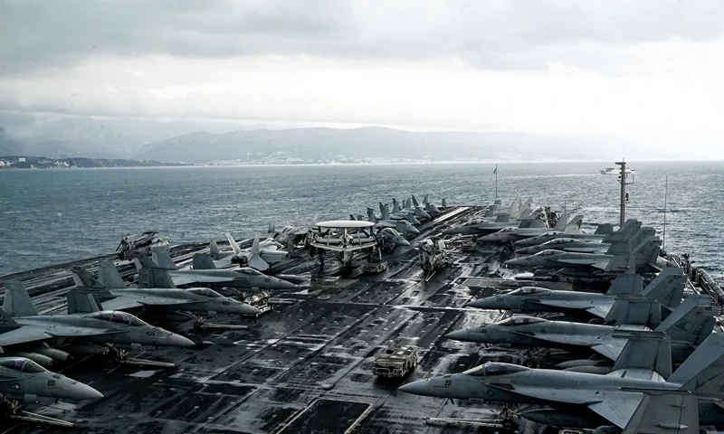 F-18 Hornet fighter jets are stationed on the deck of the nuclear-powered aircraft carrier USS Harry S. Truman, which arrived on a four-day visit and is anchored off the city of Split on February 14, 2022. (Photo by Denis LOVROVIC / AFP) (Photo by DENIS LOVROVIC/AFP via Getty Images)