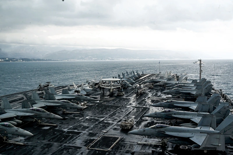 F-18 Hornet fighter jets are stationed on the deck of the nuclear-powered aircraft carrier USS Harry S. Truman, which arrived on a four-day visit and is anchored off the city of Split on February 14, 2022. (Photo by Denis LOVROVIC / AFP) (Photo by DENIS LOVROVIC/AFP via Getty Images)