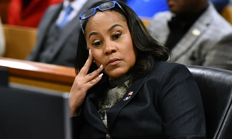 Harrison Floyd Appears For Hearing In Georgia Election Interference Case ATLANTA, GEORGIA - NOVEMBER 21: Fulton County District Attorney Fani Willis appears before Judge Scott McAfee for a hearing in the 2020 Georgia election interference case at the Fulton County Courthouse on November 21, 2023 in Atlanta, Georgia. Judge McAfee heard arguments as to whether co-defendant Harrison Floyd should be sent to jail for social media posts and comments that potentially targeted witnesses in the trial. McAfee declined to revoke Floyd's bond. Floyd was charged along with former US President Donald Trump and 17 others in an indictment that accuses them of illegally conspiring to subvert the will of Georgia voters in the 2020 presidential election. (Photo by Dennis Byron-Pool/Getty Images)