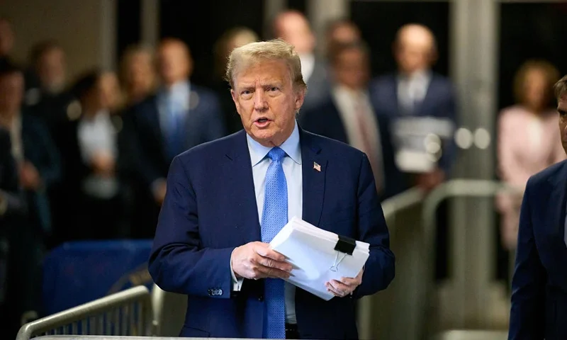 NEW YORK, NEW YORK - APRIL 26: Former U.S. President Donald Trump speaks to the media as he arrives to court during his trial for allegedly covering up hush money payments at Manhattan Criminal Court on April 26, 2024 in New York City. Former U.S. President Donald Trump faces 34 felony counts of falsifying business records in the first of his criminal cases to go to trial. (Photo by Curtis Means-Pool/Getty Images)