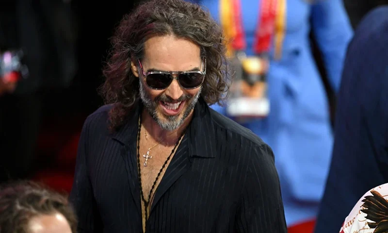 MILWAUKEE, WISCONSIN - JULY 18: Comedian and actor Russell Brand attends the fourth day of the Republican National Convention at the Fiserv Forum on July 18, 2024 in Milwaukee, Wisconsin. Delegates, politicians, and the Republican faithful are in Milwaukee for the annual convention, concluding with former President Donald Trump accepting his party's presidential nomination. The RNC takes place from July 15-18. (Photo by Leon Neal/Getty Images)