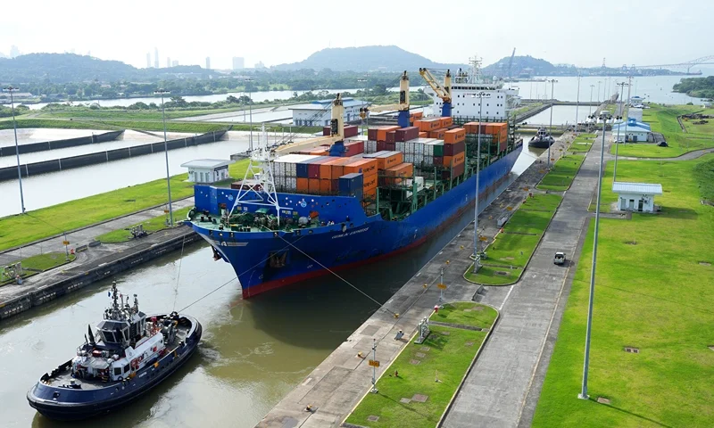 A cargo ship and tugboat sail through the Cocoli Locks at the Panama Canal, in Panama, on August 12, 2024. Next August 15 the Panama Canal celebrates its 110th inauguration anniversary. (Photo by ARNULFO FRANCO / AFP) (Photo by ARNULFO FRANCO/AFP via Getty Images)