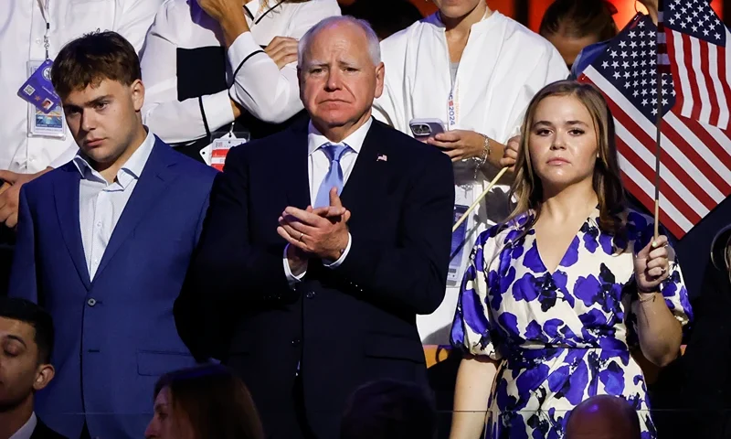 CHICAGO, ILLINOIS - AUGUST 22: (L-R) Gus Walz, Democratic vice presidential candidate Minnesota Gov. Tim Walz and Hope Walz attend the final day of the Democratic National Convention at the United Center on August 22, 2024 in Chicago, Illinois. Delegates, politicians, and Democratic Party supporters are gathering in Chicago, as current Vice President Kamala Harris is named her party's presidential nominee. The DNC takes place from August 19-22. (Photo by Kevin Dietsch/Getty Images)