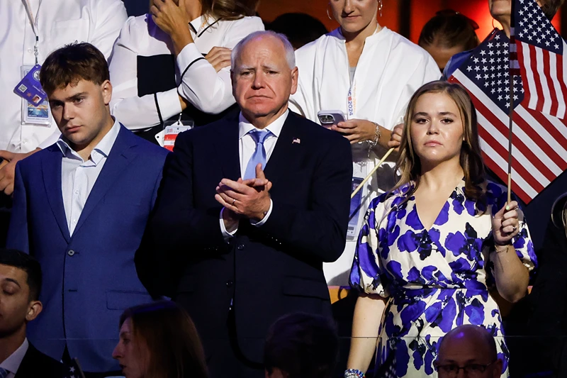 CHICAGO, ILLINOIS - AUGUST 22: (L-R) Gus Walz, Democratic vice presidential candidate Minnesota Gov. Tim Walz and Hope Walz attend the final day of the Democratic National Convention at the United Center on August 22, 2024 in Chicago, Illinois. Delegates, politicians, and Democratic Party supporters are gathering in Chicago, as current Vice President Kamala Harris is named her party's presidential nominee. The DNC takes place from August 19-22. (Photo by Kevin Dietsch/Getty Images)