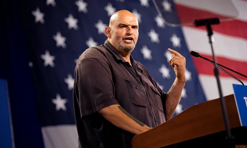 YORK, PENNSYLVANIA - OCTOBER 2: Sen. John Fetterman (D-PA) speaks at a rally for Democratic vice presidential nominee Minnesota Gov. Tim Walz at York Exposition Center UPMC Arena on October 2, 2024 in York, Pennsylvania. Walz is holding a rally a day after debating Republican vice presidential Nominee Sen. JD Vance (R-OH) at the CBS Broadcast Center in New York City. (Photo by Andrew Harnik/Getty Images)