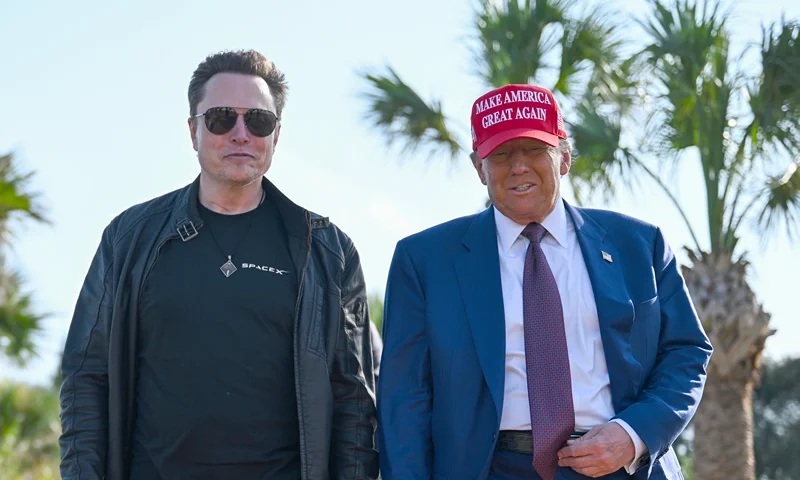 U.S. President-elect Donald Trump greets Elon Musk as he arrives to attend a viewing of the launch of the sixth test flight of the SpaceX Starship rocket on November 19, 2024 in Brownsville, Texas. SpaceX’s billionaire owner, Elon Musk, a Trump confidante, has been tapped to lead the new Department of Government Efficiency alongside former presidential candidate Vivek Ramaswamy. (Photo by Brandon Bell/Getty Images)
