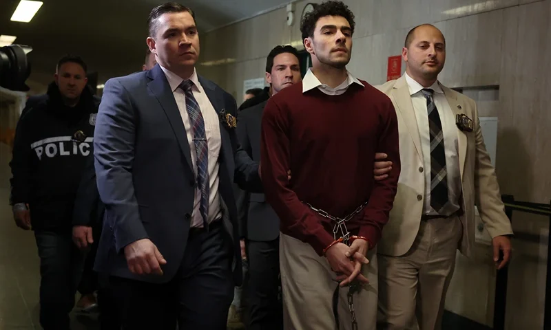 NEW YORK, NEW YORK - DECEMBER 23: Luigi Mangione arrives at Manhattan Criminal Court on December 23, 2024 in New York City. Mangione, 26, is set to appear for his arraignment on state murder charges in the killing of UnitedHealthcare CEO Brian Thompson on a Manhattan street on December 4. (Photo by Spencer Platt/Getty Images)