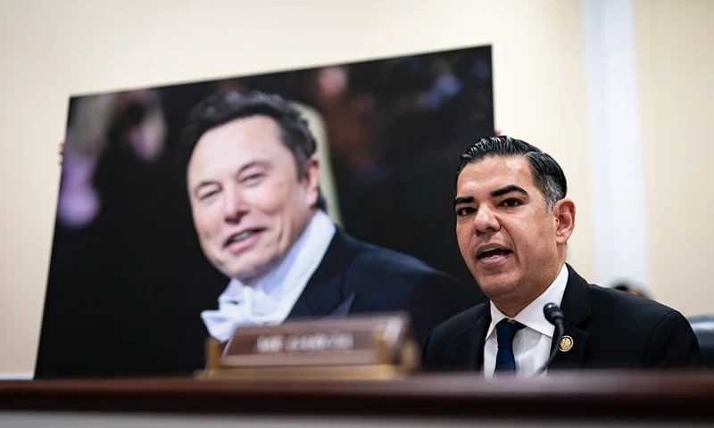 U.S. Rep. Robert Garcia (D-CA) speaks while displaying a photograph of Tesla and SpaceX CEO Elon Musk, during the House Oversight and Government Reform Subcommittee on Delivering on Government Efficiency in the Rayburn House Office Building on February 12, 2025 in Washington, DC. The subcommittee held a hearing titled "The War on Waste: Stamping Out the Scourge of Improper Payments and Fraud." (Photo by Al Drago/Getty Images)