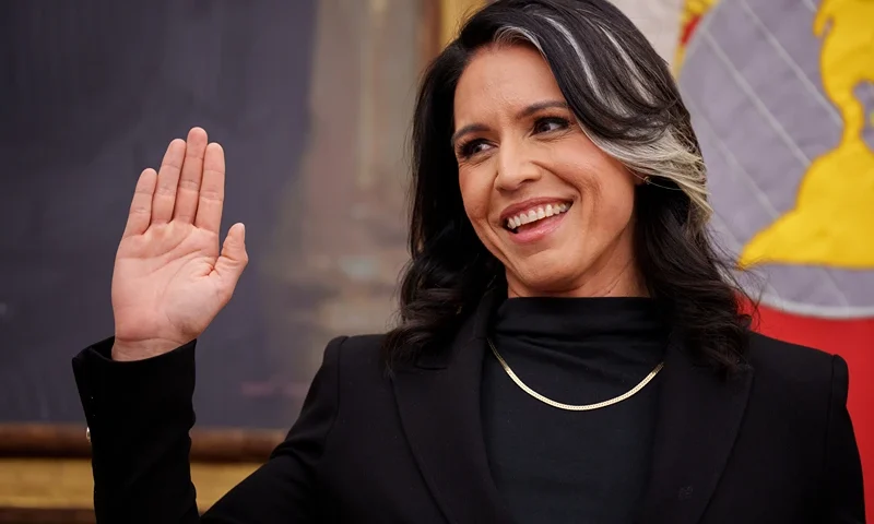 WASHINGTON, DC - FEBRUARY 12: Tulsi Gabbard is sworn in as Director of National Intelligence in the Oval Office at the White House on February 12, 2025 in Washington, DC. Gabbard, who will oversee the 18 intelligence agencies and serve as Trump's advisory on intelligence, was confirmed by the Senate 52-48. (Photo by Andrew Harnik/Getty Images)