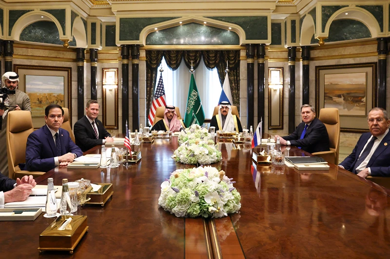 (L to R) US Middle East envoy Steve Witkoff, Secretary of State Marco Rubio, National Security Advisor Mike Waltz, Saudi Arabia's Foreign Minister Prince Faisal bin Farhan al-Saud, National Security Advisor Mosaad bin Mohammad al-Aiban, the Russian president's foreign policy advisor Yuri Ushakov, and Russia's Foreign Minister Sergei Lavrov attend a meeting together at Riyadh's Diriyah Palace on February 18, 2025. Top US and Russian diplomats were meeting in Saudi Arabia on Tuesday for talks on resetting their countries' fractured relations and making a tentative start on trying to end the Ukraine war. Both sides played down the chances that the first high-level meeting between the countries since US President Donald Trump took office would result in a breakthrough. (Photo by Evelyn Hockstein / POOL / AFP) (Photo by EVELYN HOCKSTEIN/POOL/AFP via Getty Images)