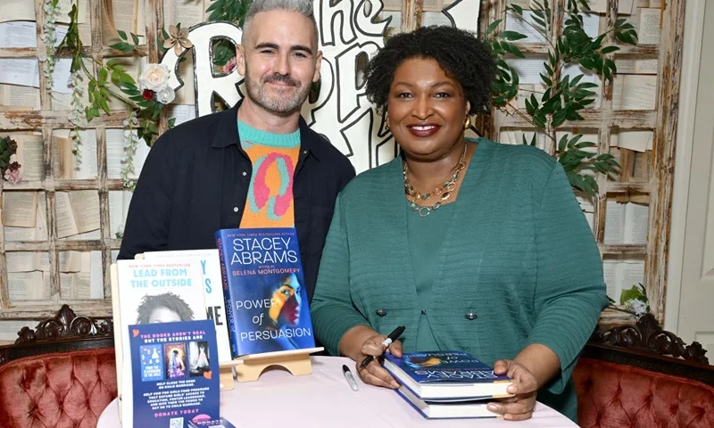 BROOKLYN, NEW YORK - FEBRUARY 13: (L-R) CEO, VOW for Girls, Clay Dunn and Former Minority Leader of the Georgia House of Representatives & Romance Author, Stacey Abrams attend The Ripped Bodice hosts VOW for Girls' "Every Girl Deserves Happily Ever After" event to end child marriage at The Ripped Bodice on February 13, 2025 in Brooklyn, New York. (Photo by Slaven Vlasic/Getty Images for VOW for Girls)