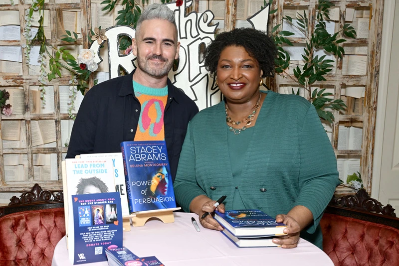 BROOKLYN, NEW YORK - FEBRUARY 13: (L-R) CEO, VOW for Girls, Clay Dunn and Former Minority Leader of the Georgia House of Representatives & Romance Author, Stacey Abrams attend The Ripped Bodice hosts VOW for Girls' "Every Girl Deserves Happily Ever After" event to end child marriage at The Ripped Bodice on February 13, 2025 in Brooklyn, New York. (Photo by Slaven Vlasic/Getty Images for VOW for Girls)