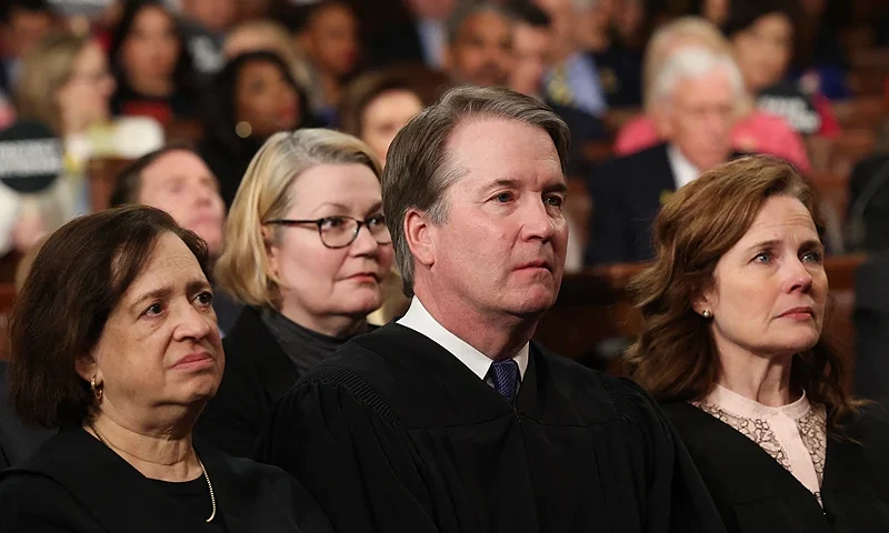 (L-R) US Supreme Court Justice Elena Kagan, Supreme Court Chief Justice John Roberts and Amy Coney Barrett listen to US President Donald Trump speak during an address to a joint session of Congress at the US Capitol in Washington, DC, on March 4, 2025. (Photo by Win McNamee / POOL / AFP) (Photo by WIN MCNAMEE/POOL/AFP via Getty Images)