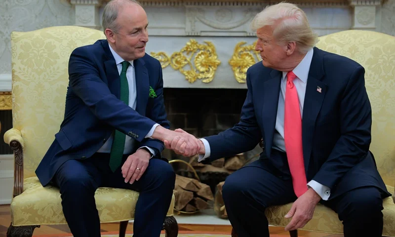 Irish Taoiseach Micheal Martin and U.S. President Donald Trump shake hands as they speak to journalists ahead of meetings in the Oval Office at the White House on March 12, 2025 in Washington, DC. Martin is visiting the United States for the Irish leader's annual St. Patrick's Day visit where he met with U.S. President Donald Trump ahead of a St. Patrick's Day luncheon with Congressional leaders. (Photo by Chip Somodevilla/Getty Images)