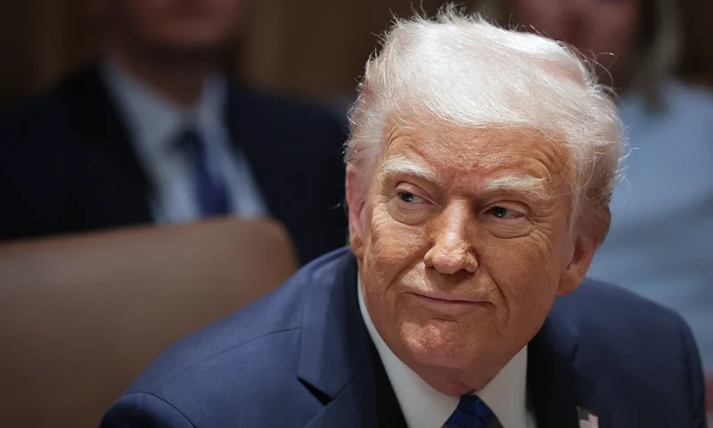 WASHINGTON, DC - MARCH 25: U.S. President Donald Trump listens to a reporter's question during an Ambassador Meeting in the Cabinet Room of the White House on March 25, 2025 in Washington, DC. During the meeting, Trump answered questions from reporters on the news that Jeffrey Goldberg, the editor-in-chief of The Atlantic magazine, was accidentally added to a Signal group chat of top administration officials, where highly sensitive national security information was discussed. (Photo by Win McNamee/Getty Images)