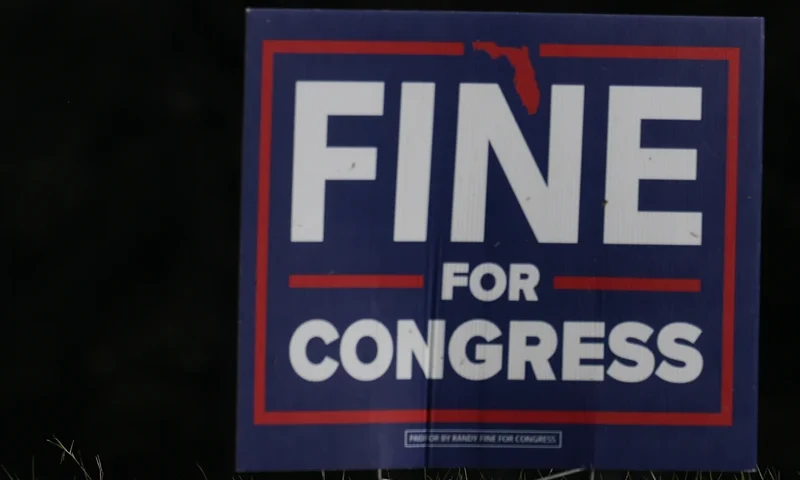 Campaign signs sit on the side of the road supporting Democratic nominee Josh Weil outside of his campaign event at the Silver Springs Shores Community Center on March 26, 2025 in Ocala, Florida. Polls show that Mr. Weil is within the margin of error in defeating Republican Randy Fine to flip National Security Advisor Mike Waltz's old seat in the U.S. House of Representatives. The race for the 6th district is one of two Florida Congressional special elections set for April 1st. (Photo by Joe Raedle/Getty Images)