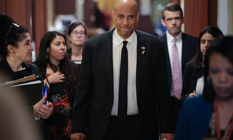 WASHINGTON, DC - APRIL 01: U.S. Sen. Cory Booker (D-NJ) walks toward reporters after delivering a record setting floor speech for the U.S. Senate at the U.S. Capitol on April 01, 2025 in Washington, DC. Booker spoke for over 25 hours, protesting President Trump’s agenda on the Senate floor, breaking a record set by Sen. Strom Thurmond’s 24 hour, 18 minute filibuster against the Civil Rights Act in 1957. (Photo by Win McNamee/Getty Images)