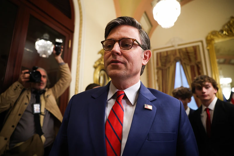 WASHINGTON, DC - APRIL 02: U.S. Speaker of the House Rep. Mike Johnson (R-LA) (L) speaks to after participating in a ceremonial swearing-in for Patronis (R-FL) and Randy Fine (R-FL) at the U.S. Capitol on April 02, 2025 in Washington, DC. The swearing-in comes after Johnson sent the House home until the following Monday after trying to block a vote on Rep. Anna Paulina Luna's (R-FL) proposal for proxy voting for new parents failed. (Photo by Kayla Bartkowski/Getty Images)