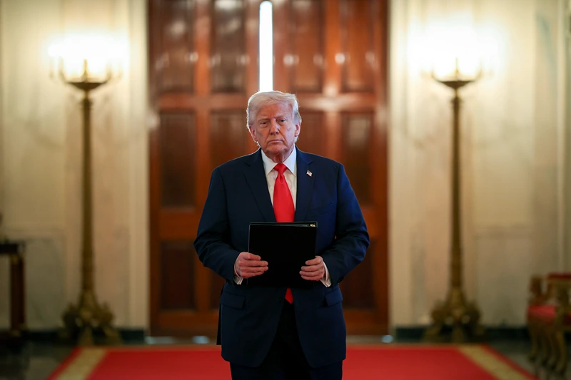 WASHINGTON, DC - APRIL 15: U.S. President Donald Trump arrives for a presentation ceremony for the Commander-in-Chief Trophy to the U.S. Naval Academy in the East Room of the White House on April 15, 2025 in Washington, DC. The Commander-in-Chief Trophy is awarded to the winner of the American college football series among the teams of the U.S. Military Academy (Army Black Knights), the U.S. Naval Academy (Navy Midshipmen), and the U.S. Air Force Academy (Air Force Falcons). (Photo by Win McNamee/Getty Images)