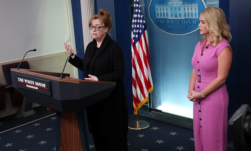 WASHINGTON, DC - APRIL 16: Patty Morin (L), mother of Rachel Morin, speaks as White House Press Secretary Karoline Leavitt looks on during a daily press briefing in the Brady Press Briefing Room at the White House on April 16, 2025 in Washington, DC. In 2023, Morin's daughter was murdered by Victor Martinez-Hernandez, an illegal immigrant from El Salvador who was convicted of first-degree murder and first-degree rape on Monday. During the briefing, Leavitt addressed the Trump administration's illegal deportation of Kilmar Armando Abrego Garcia, a Maryland man who has been held in prison in El Salvador since March 15. (Photo by Win McNamee/Getty Images)