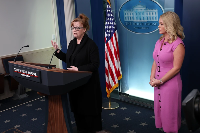 WASHINGTON, DC - APRIL 16: Patty Morin (L), mother of Rachel Morin, speaks as White House Press Secretary Karoline Leavitt looks on during a daily press briefing in the Brady Press Briefing Room at the White House on April 16, 2025 in Washington, DC. In 2023, Morin's daughter was murdered by Victor Martinez-Hernandez, an illegal immigrant from El Salvador who was convicted of first-degree murder and first-degree rape on Monday. During the briefing, Leavitt addressed the Trump administration's illegal deportation of Kilmar Armando Abrego Garcia, a Maryland man who has been held in prison in El Salvador since March 15. (Photo by Win McNamee/Getty Images)