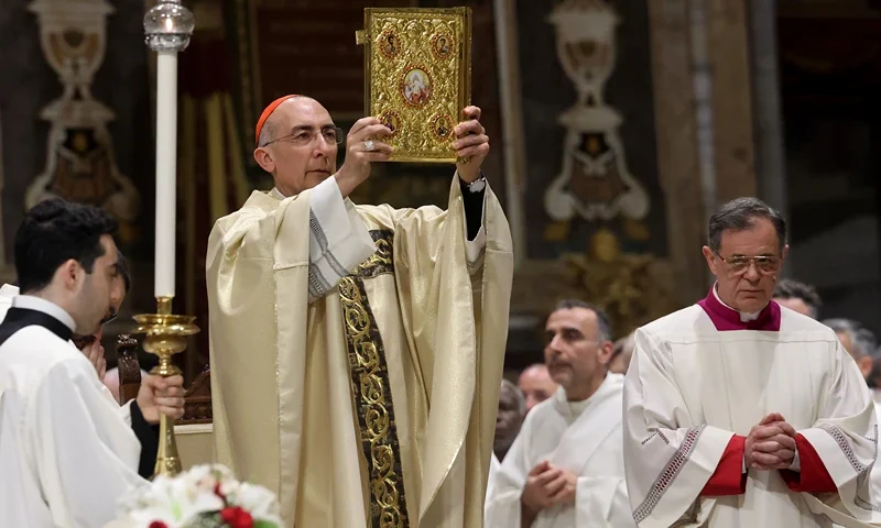 ROME, ITALY - APRIL 21: Cardinal Baldassare Reina presides over an Eucharistic celebration for Pope Francis at St. John Basilica on April 21, 2025 in Rome, Italy. The Vatican announced that Pope Francis, 88, died "this morning at 07:35 local time (05:35 GMT) the Bishop of Rome, Francis, returned to the home of the Father". His death comes after he appeared in St Peter's Square yesterday, wishing thousands of worshippers "Happy Easter." (Photo by Franco Origlia/Getty Images)