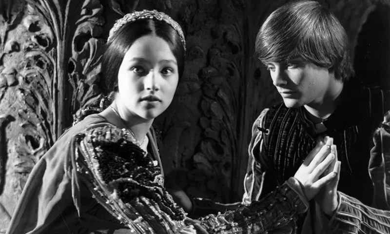 circa 1967: British actors Olivia Hussey and Leonard Whiting join hands in 'Romeo and Juliet'. (Photo by Larry Ellis/Express/Getty Images)