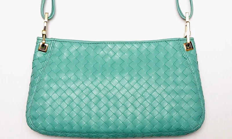 LONDON, MARCH 30: A hand bag from Fashion Designer Bottega Veneta is seen on display ahead of a Gala Evening and Charity Auction to coincide with Marie Curie Cancer Care?s Great Daffodil Appeal at The Royal Exchange on March 30, 2006, in London, England. Celebrities including Trinny Woodall, Sadie Frost, Jemima Khan and Jodie Kidd have all contributed their treasured designer handbags and JK Rowling has donated an exclusive Harry Potter satchel to go under the hammer for charity. (Photo by Marie Curie Cancer Care via Getty Images)