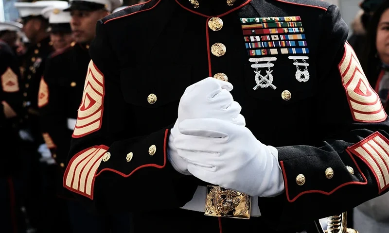 NEW YORK, NY - NOVEMBER 11: U.S. Marines prepare to march in the Veterans Day Parade on November 11, 2017 in New York City. The largest Veterans Day event in the nation, this year's parade features thousands of marchers, including military units, civic and youth groups, businesses and high school bands from across the country and veterans of all eras. The U.S. Air Force is this year's featured service and the grand marshal is space pioneer Buzz Aldrin. (Photo by Spencer Platt/Getty Images)
